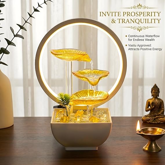 Decorative water fountain with LED light on a table, featuring text about prosperity and tranquility.