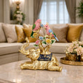 Golden elephant and parrot decorative showpiece with colorful floral detailing for tabletop decor