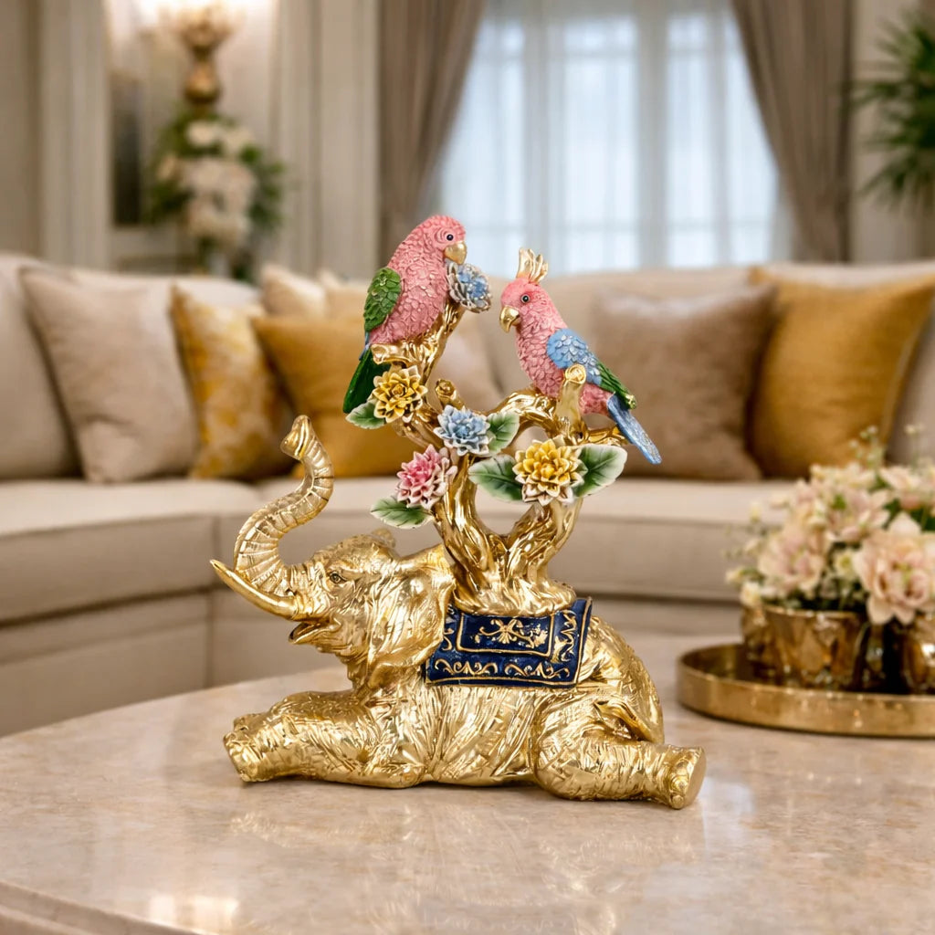 Golden elephant and parrot decorative showpiece with colorful floral detailing for tabletop decor