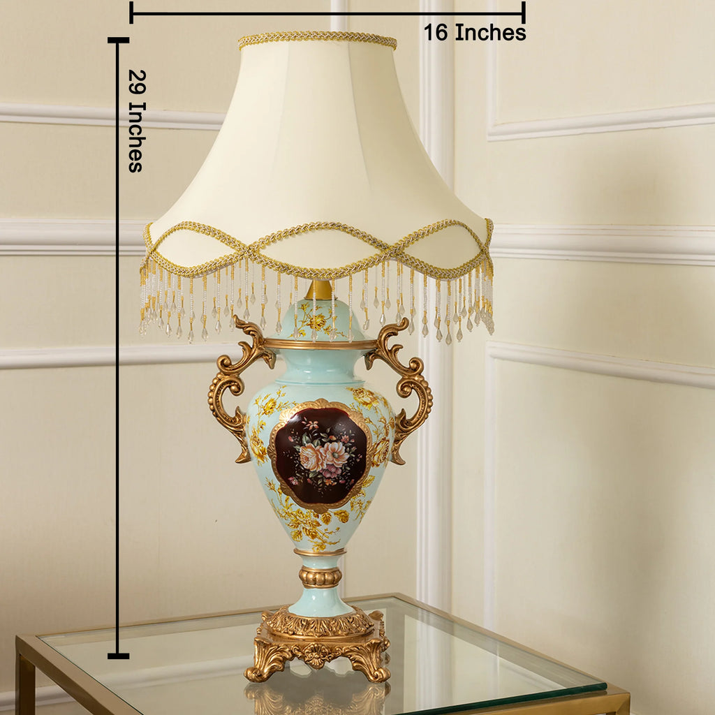 Decorative table lamp with measurements on a plain background