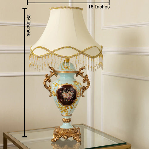 Decorative table lamp with measurements on a plain background