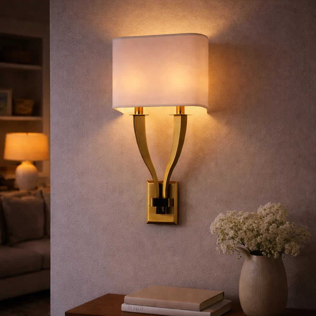 Wall-mounted lamp with a soft glow in a cozy room setting.