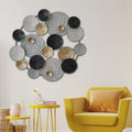 Modern circular metal wall art with textured geometric detailing for contemporary interiors